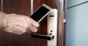 Shows keyless entry digital door lock operated via smartphone